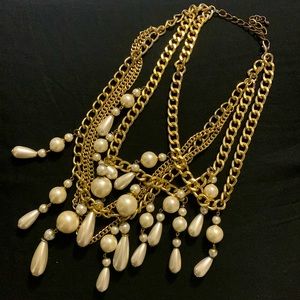 Gold and pearls beautiful costume necklace that will work well with jeans,suit